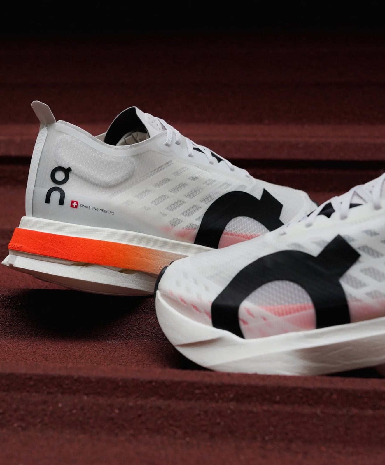 On Running Cloudboom Strike White Black Orange