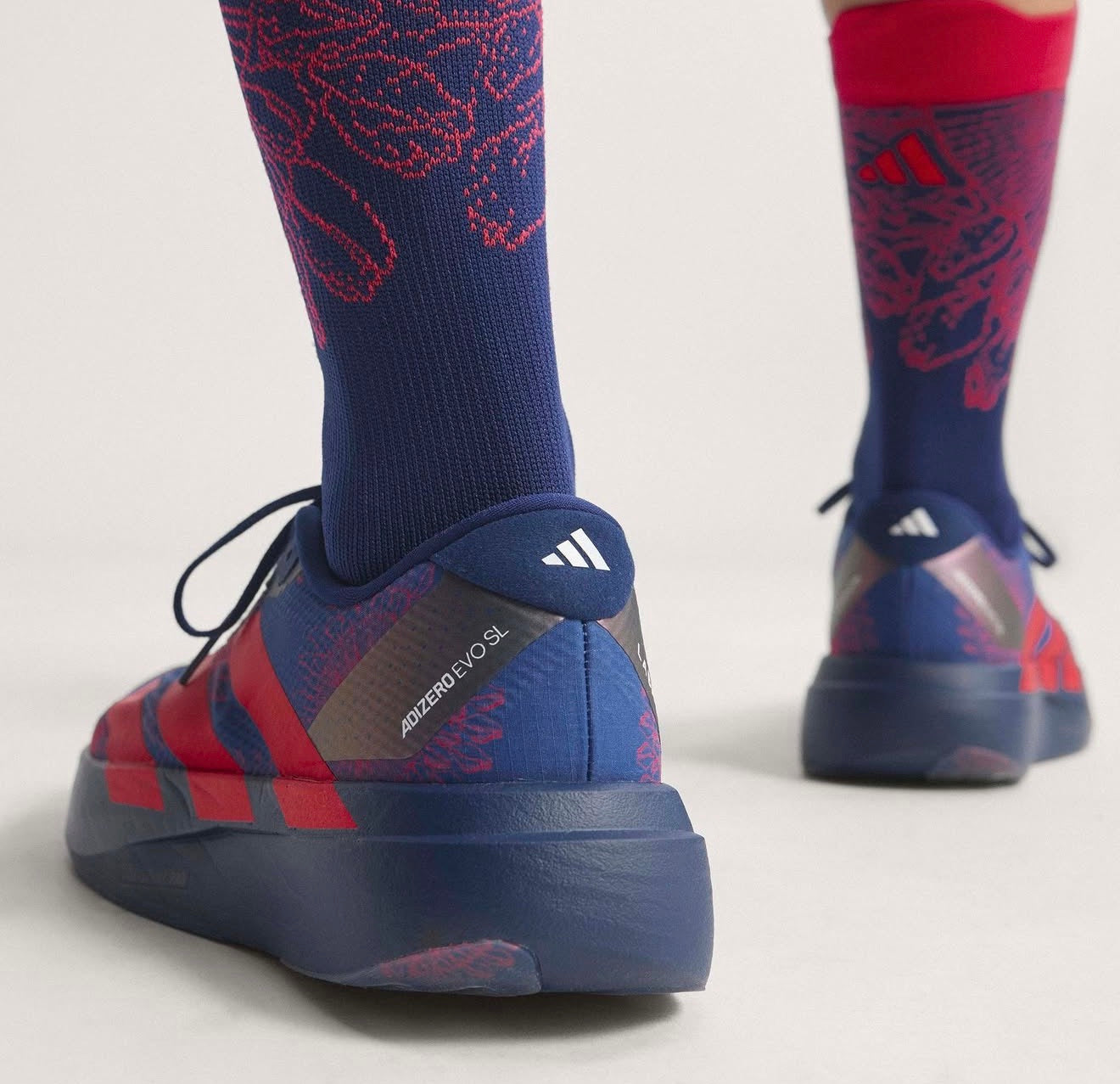 Adizero Evo SL LABRUM Dark Blue Lucid Red