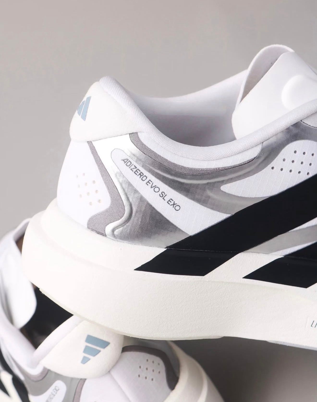 Adizero EVO SL EXO White Black Silver
