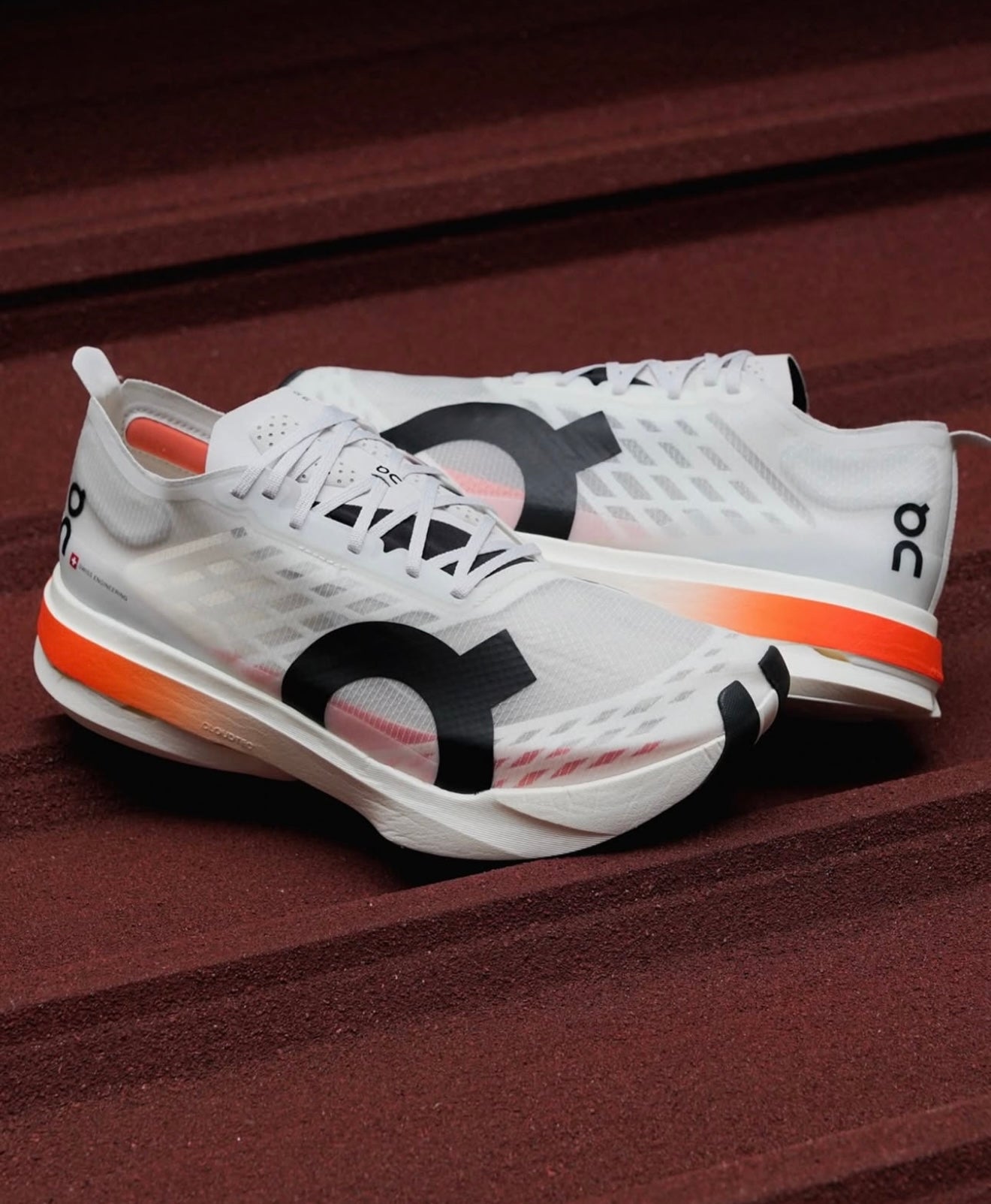 On Running Cloudboom Strike White Black Orange
