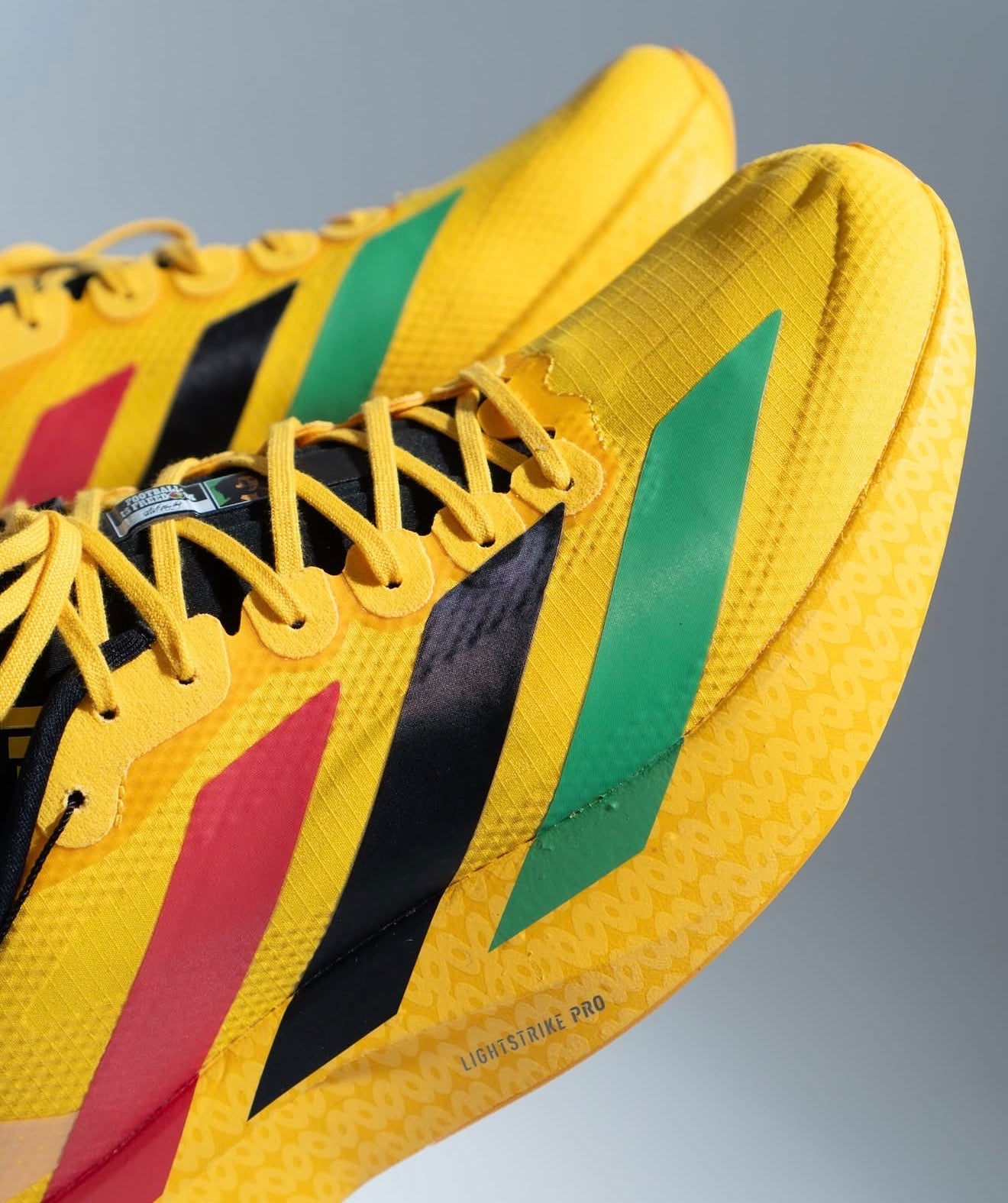 Adizero Evo SL Bob Marley Bold Gold