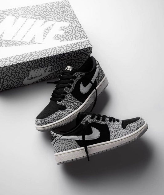 Air Jordan 1 Low “ Black Cement “