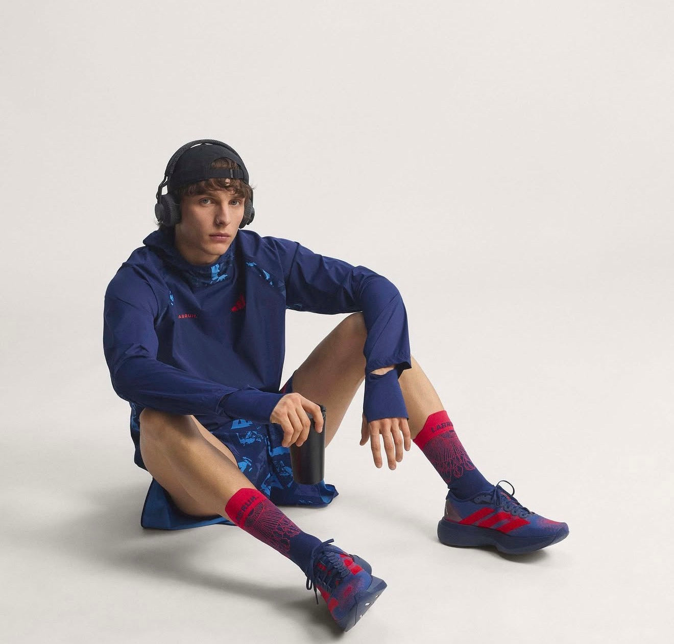 Adizero Evo SL LABRUM Dark Blue Lucid Red