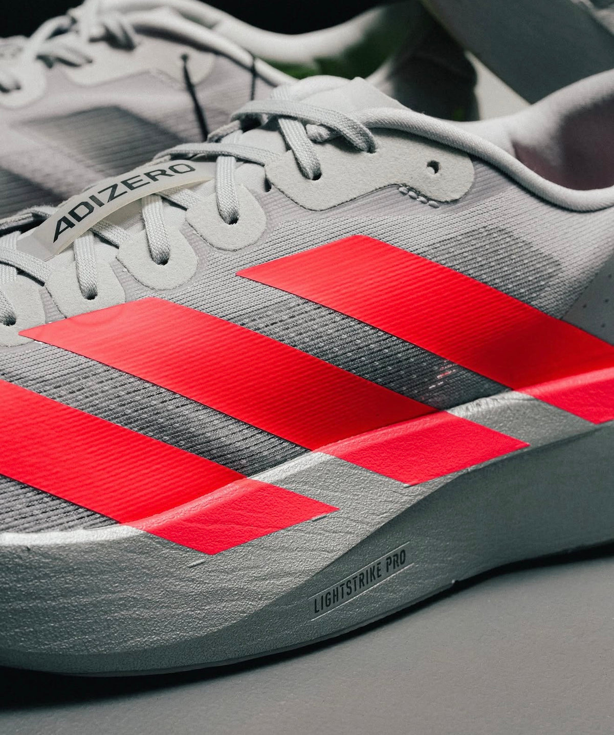 Adizero Evo SL Silver Metallic Lucid Red