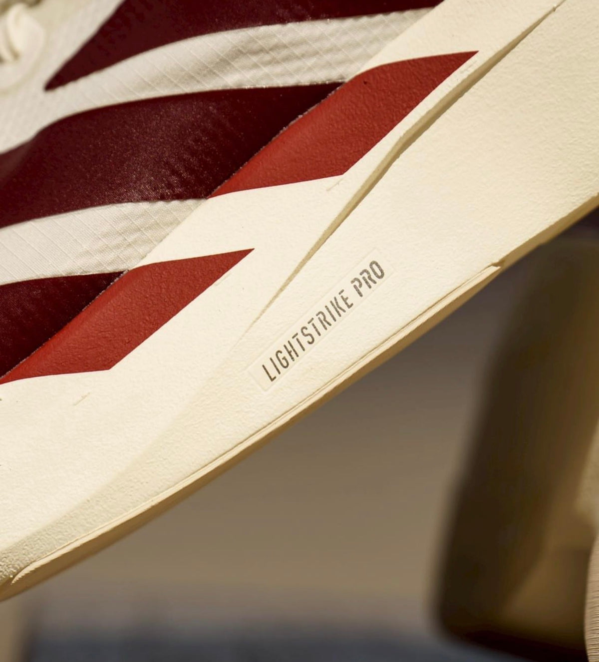 Adizero Evo SL Cream Maroon
