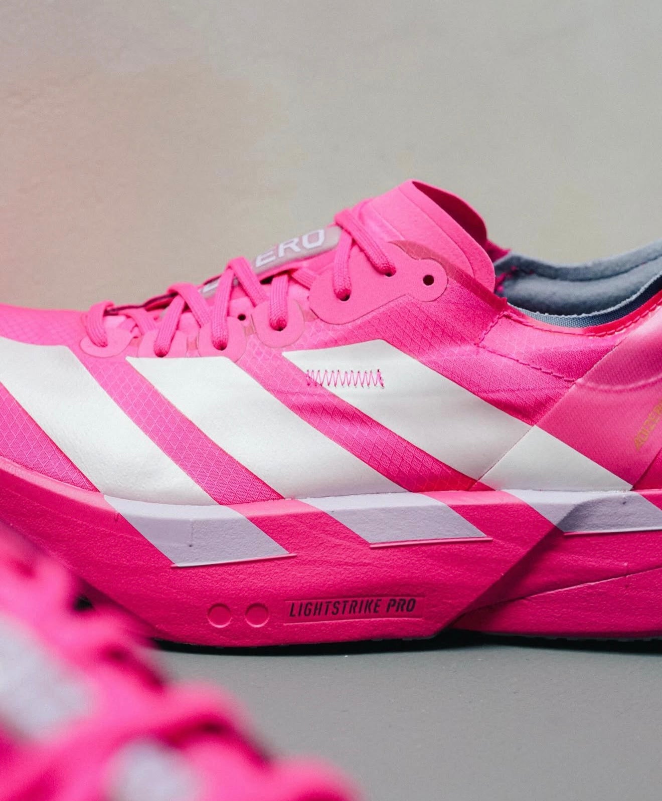 WMNs Adizero Adios Pro 4 Shock Pink