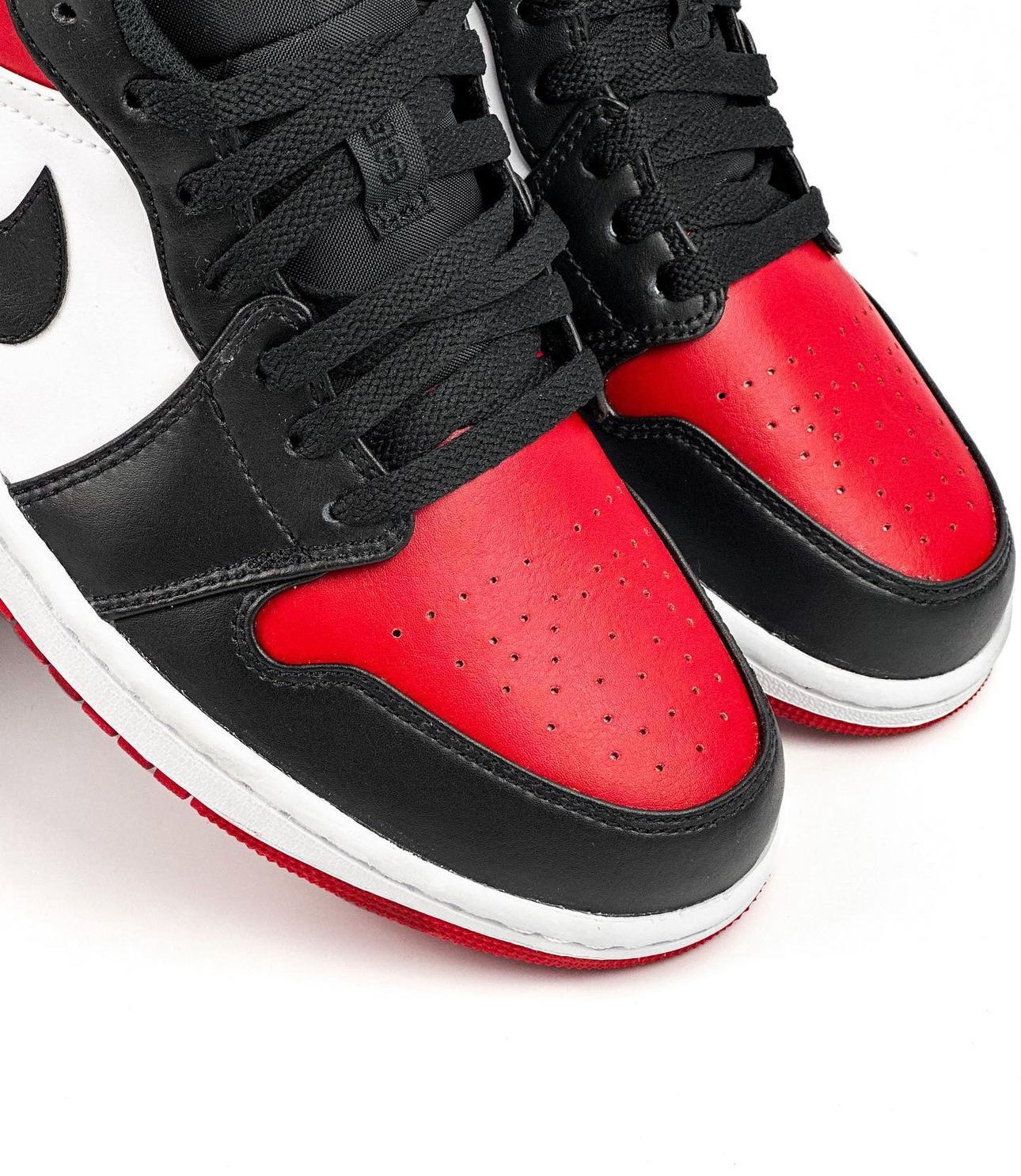 WMNs Air Jordan 1 Low “ Bred Toe “