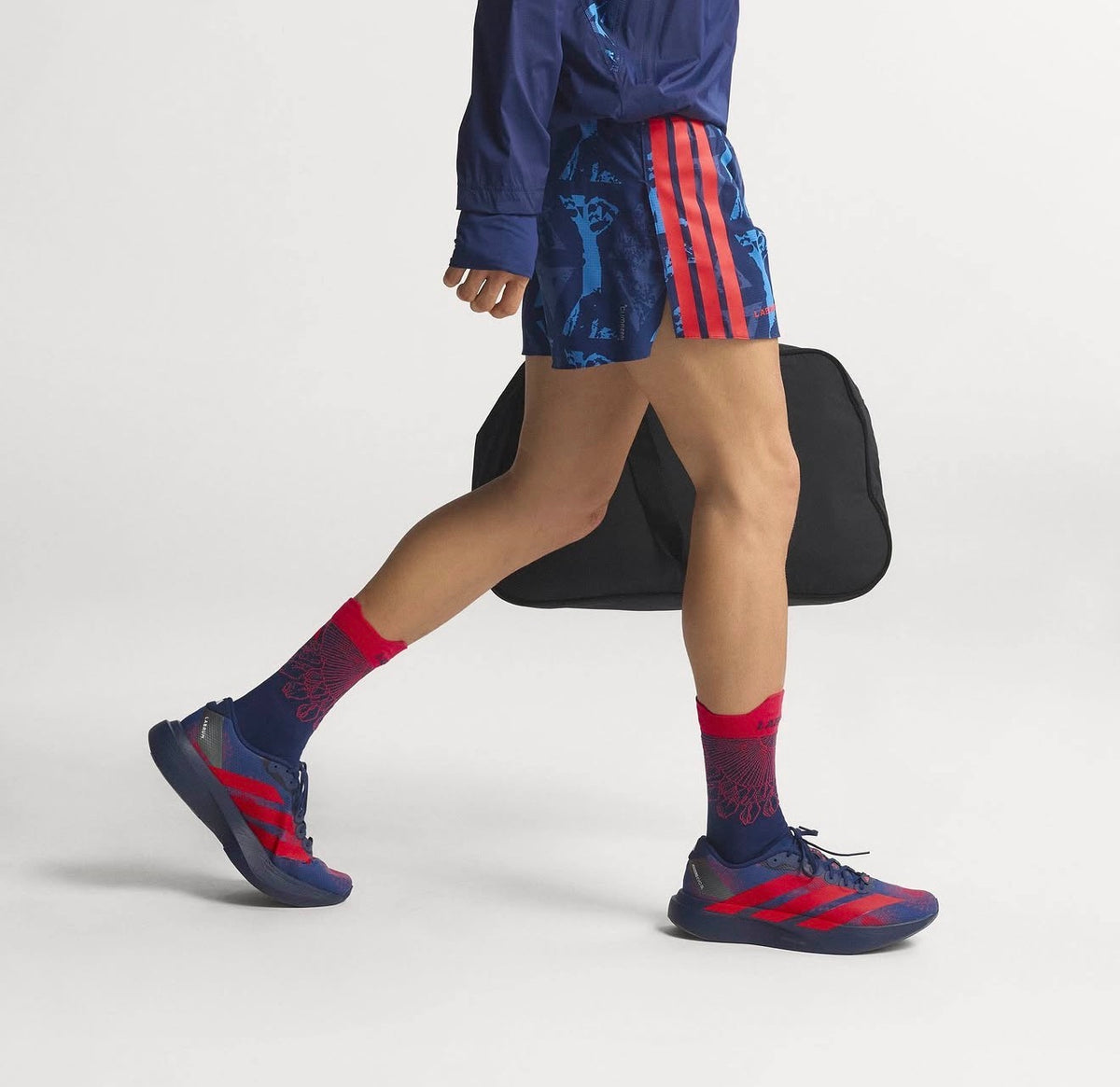 Adizero Evo SL LABRUM Dark Blue Lucid Red