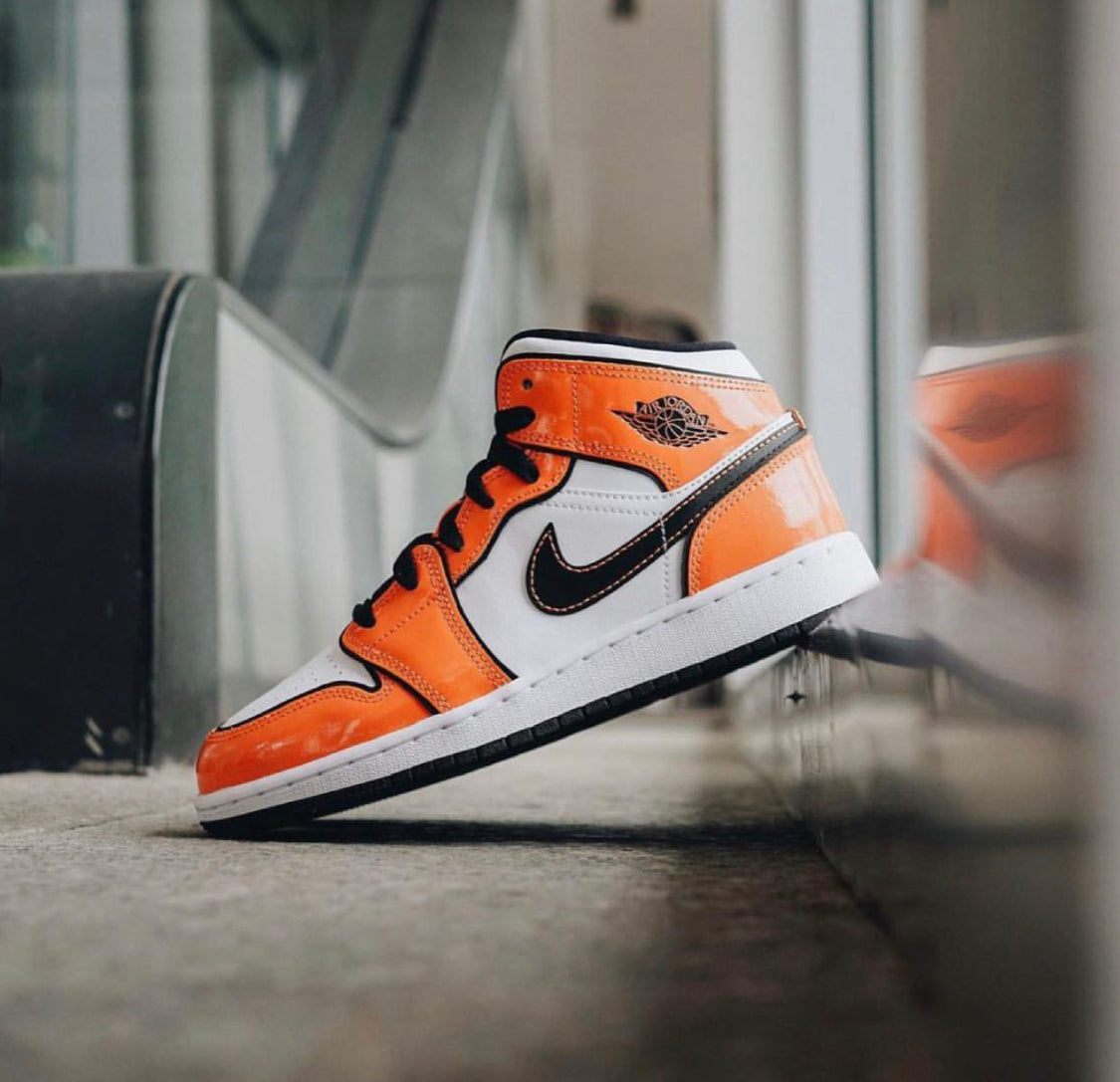 Air Jordan Retro 1 Mid “ Turf Orange ”