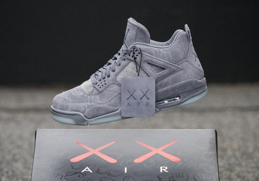 Kaws x Air Jordan 4 Grey ( Glows In Dark )