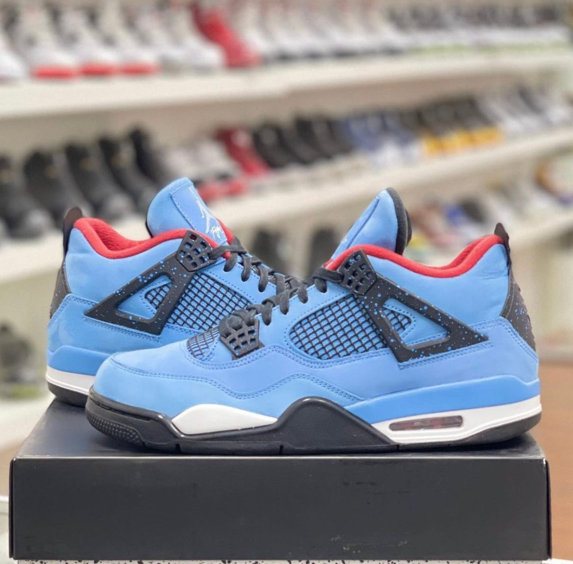 Travis Scott x Air Jordan 4 - “Cactus Jack Houston Oilers”