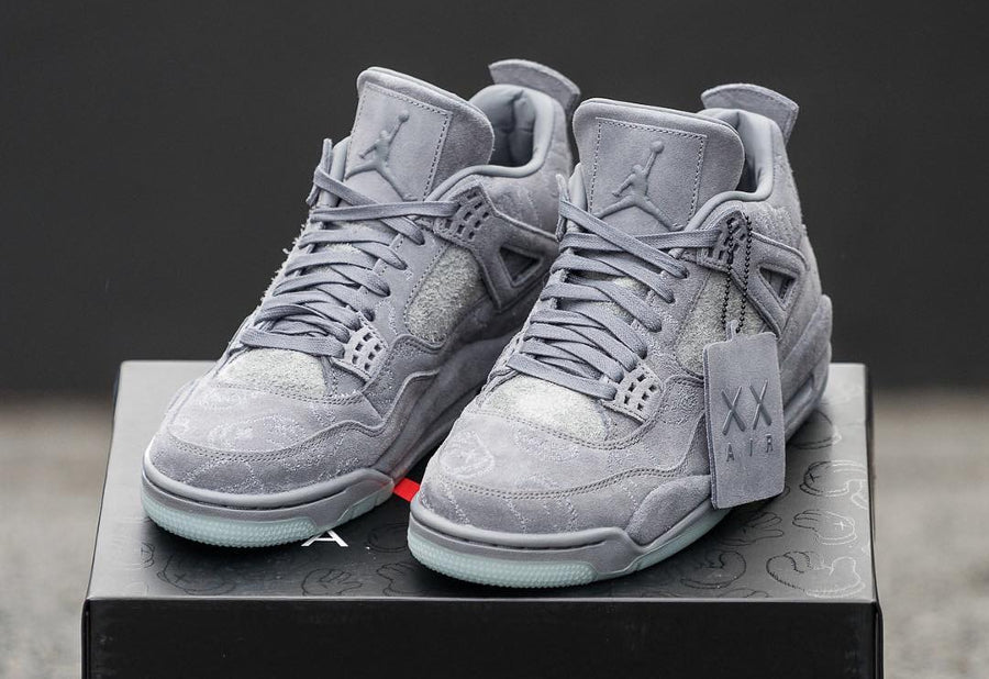 Kaws x Air Jordan 4 Grey ( Glows In Dark )