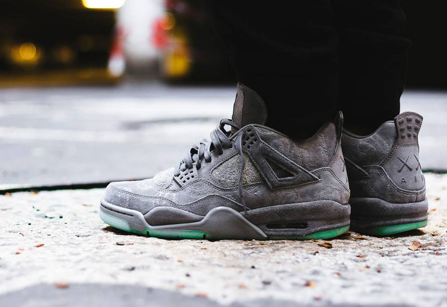 Kaws x Air Jordan 4 Grey ( Glows In Dark )